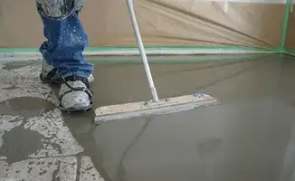 Uneven floor being professionally repaired in Des Moines, IA